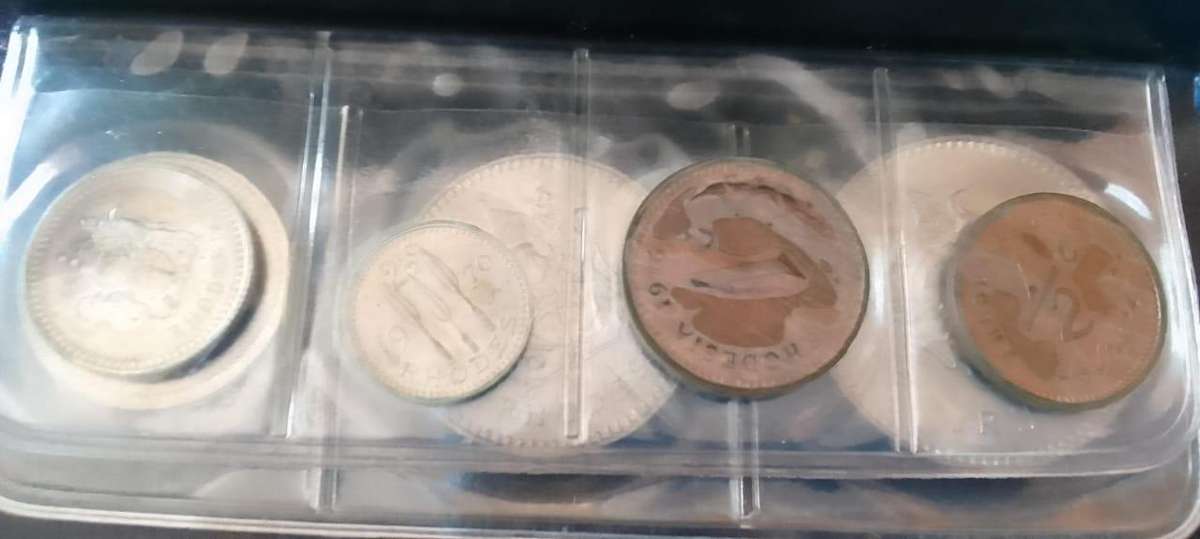 COINS OF RHODESIA SET - IN LEATHER POUCH - 1970`S