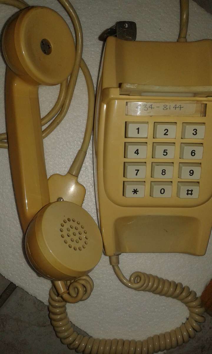 Vintage button phone - with plug and key