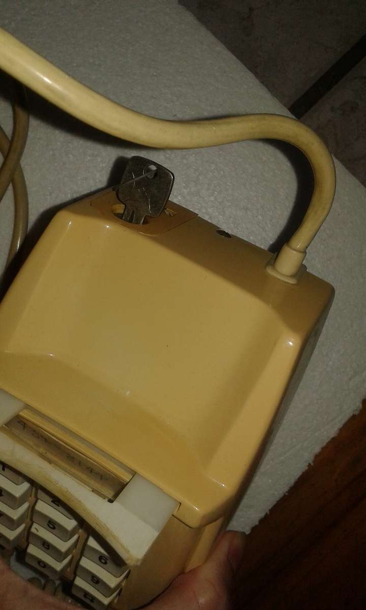 Vintage button phone - with plug and key