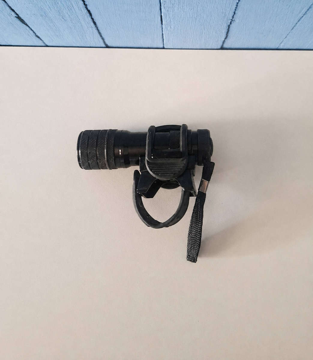Flashlight with bike handlebar bracket
