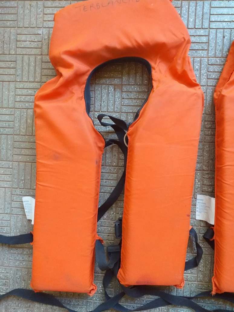 Two antique life jackets sold as a set