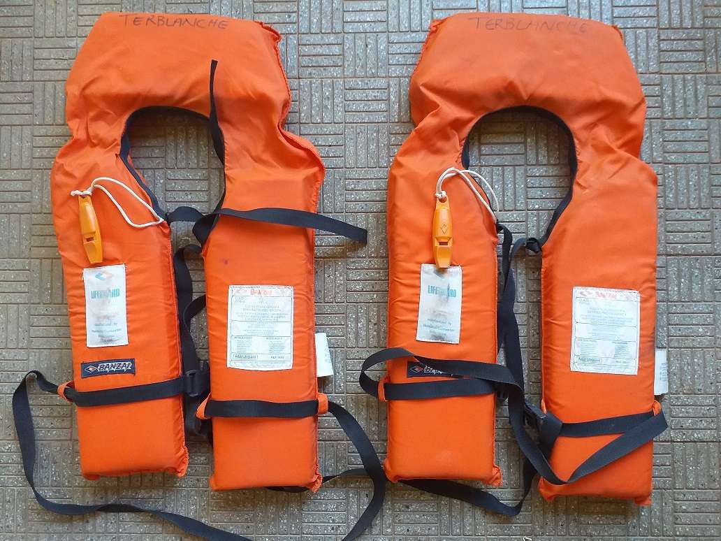 Two antique life jackets sold as a set