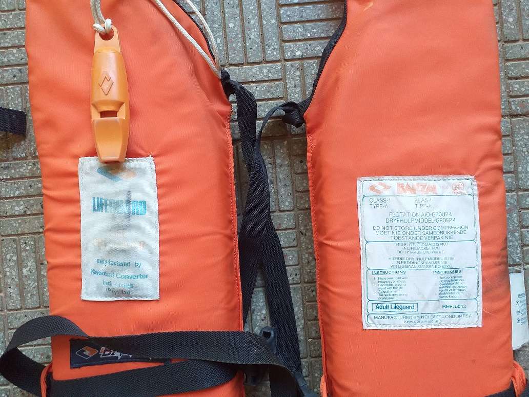 Two antique life jackets sold as a set