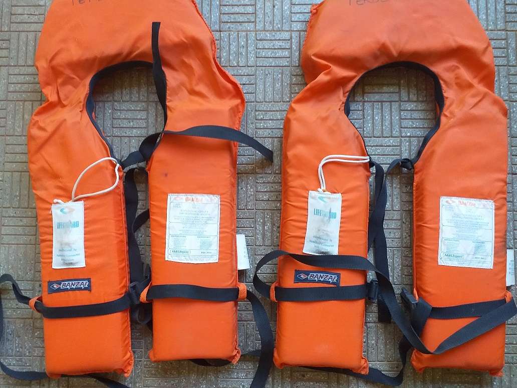 Two antique life jackets sold as a set