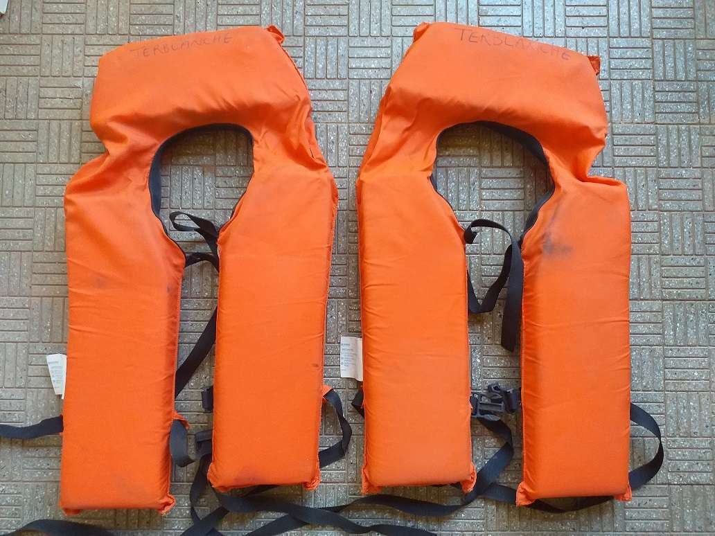Two antique life jackets sold as a set
