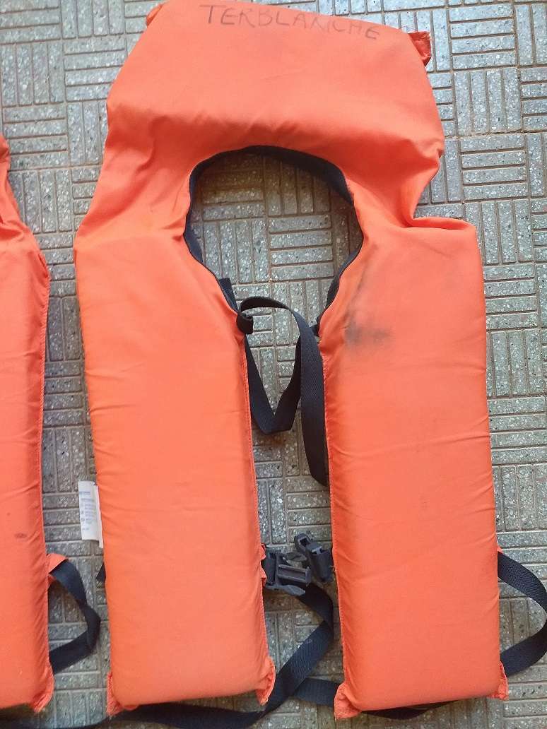 Two antique life jackets sold as a set