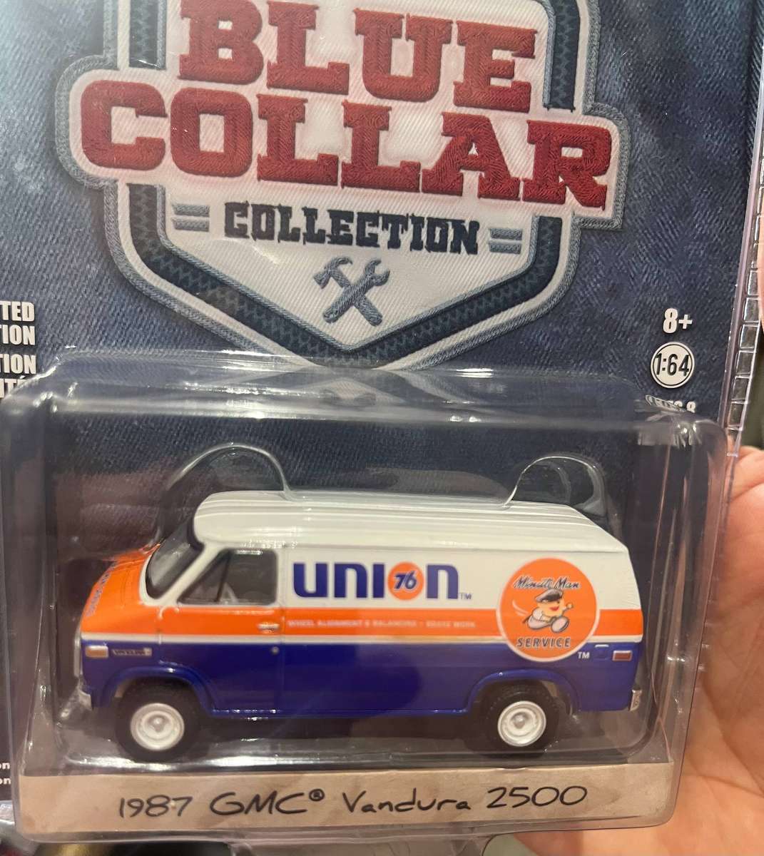 Greenlight 1/64.  Blue collar Union GMC van