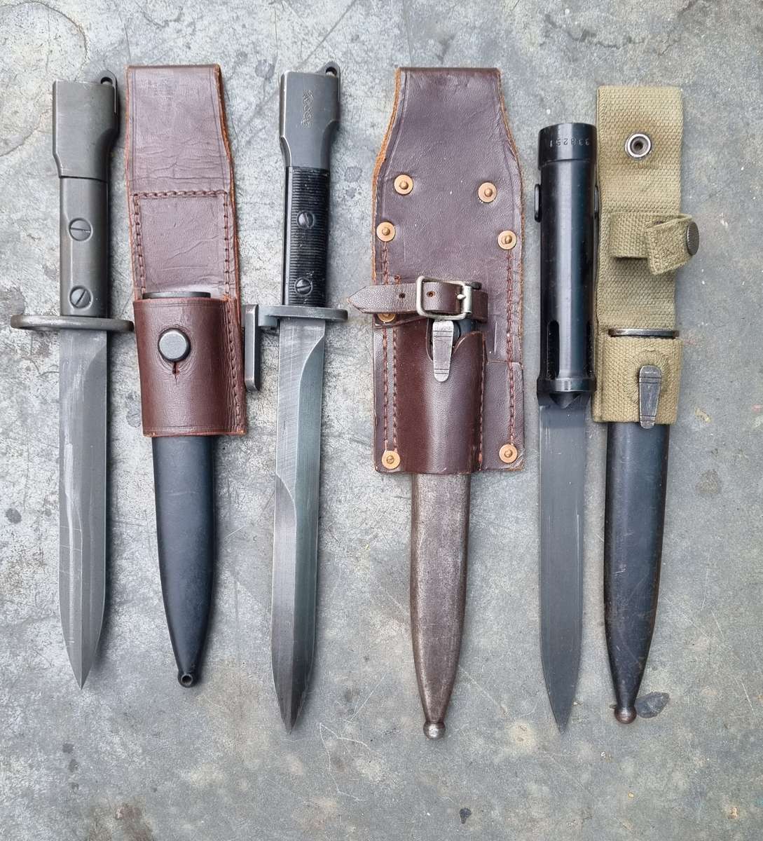 A SET OF THREE FN FAL BAYONETS FOR SALE