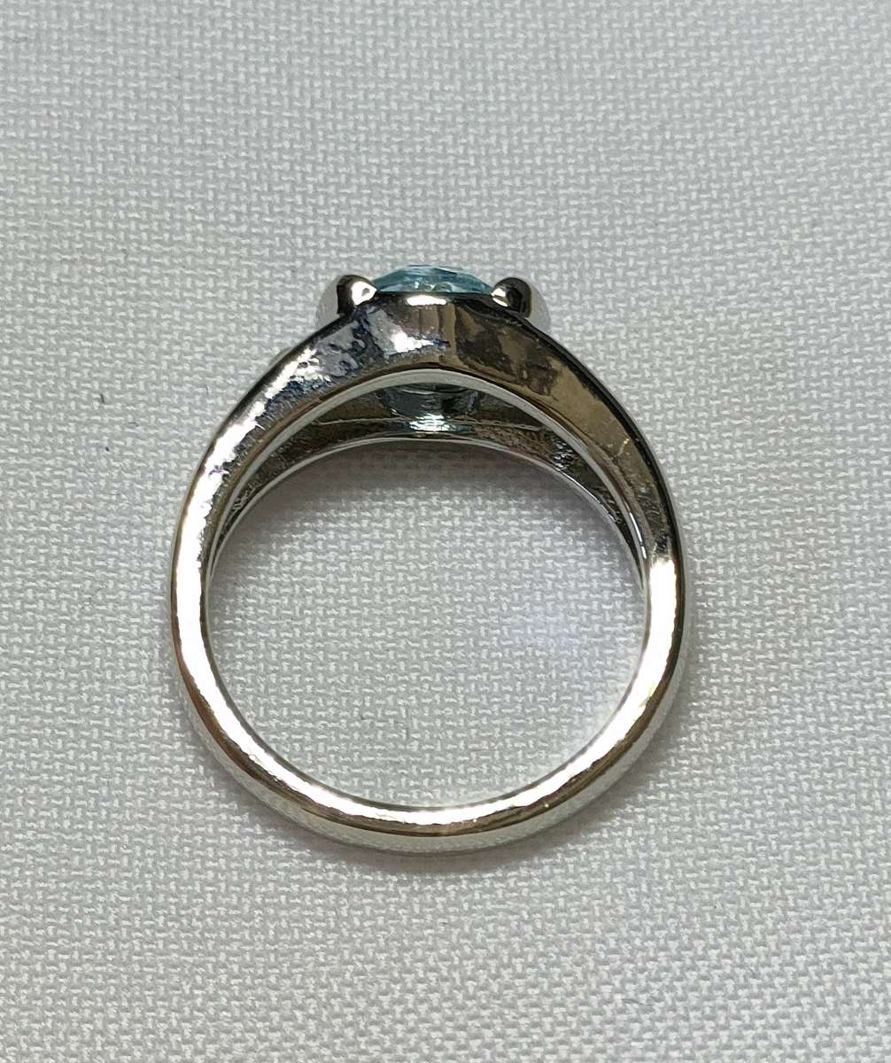 Gorgeous Lab created Blue Topaz and White CZ ring: Size US7