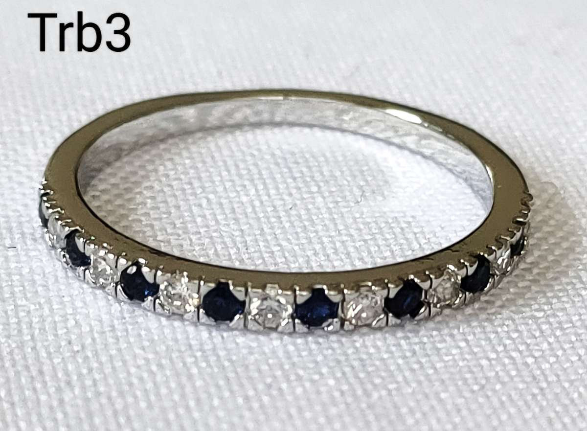 Dress ring -lab created blue and white stones- size US 7