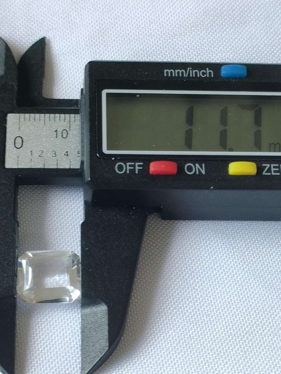 Large White Topaz- 11.7 mm -naturally mined - emerald cut - certification available