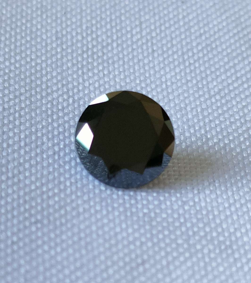 1.5 ct Black Moissanite: Round Brilliant cut: