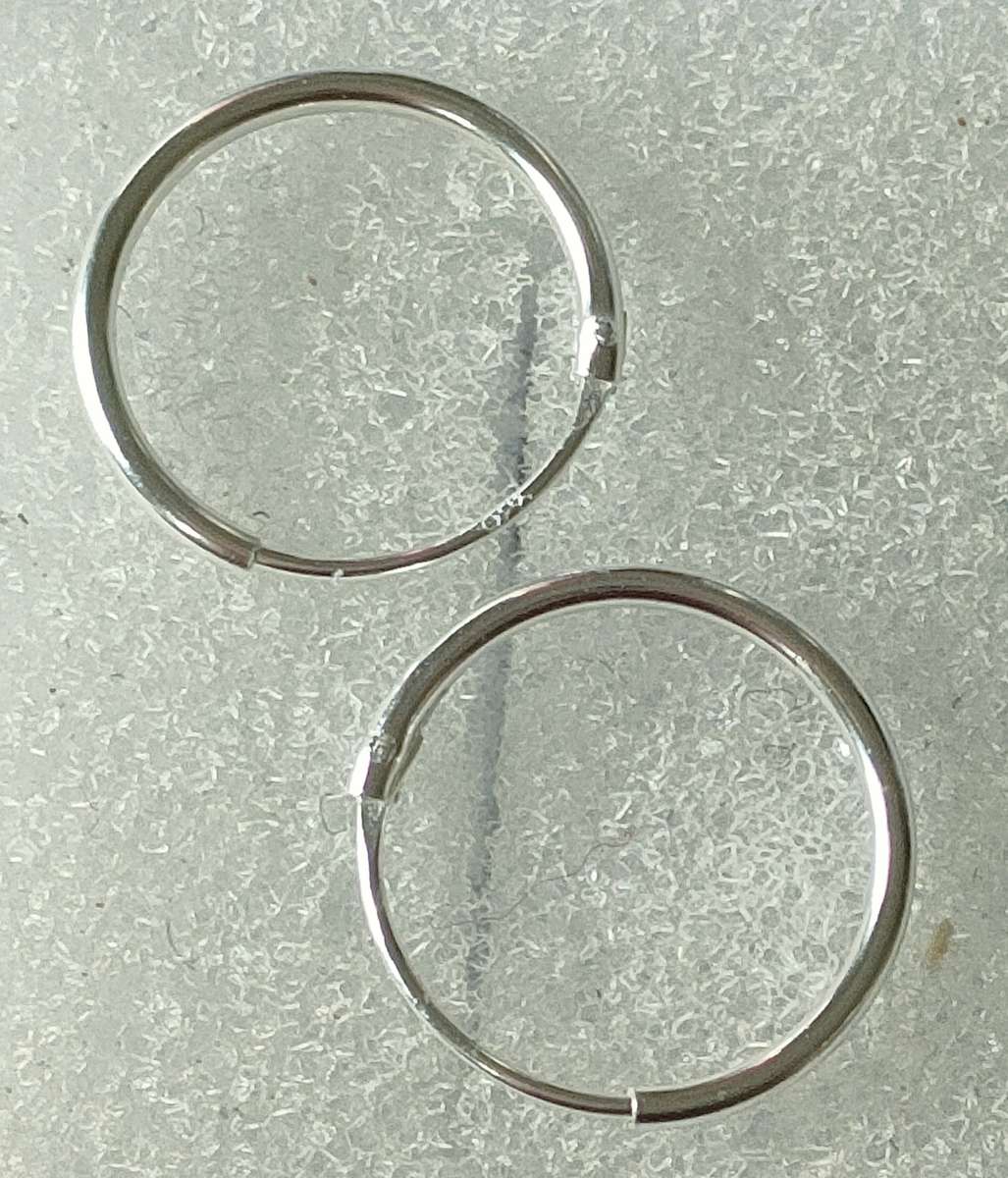 New Sterling Silver Hoop earrings: Gorgeous design. Stamped 925: