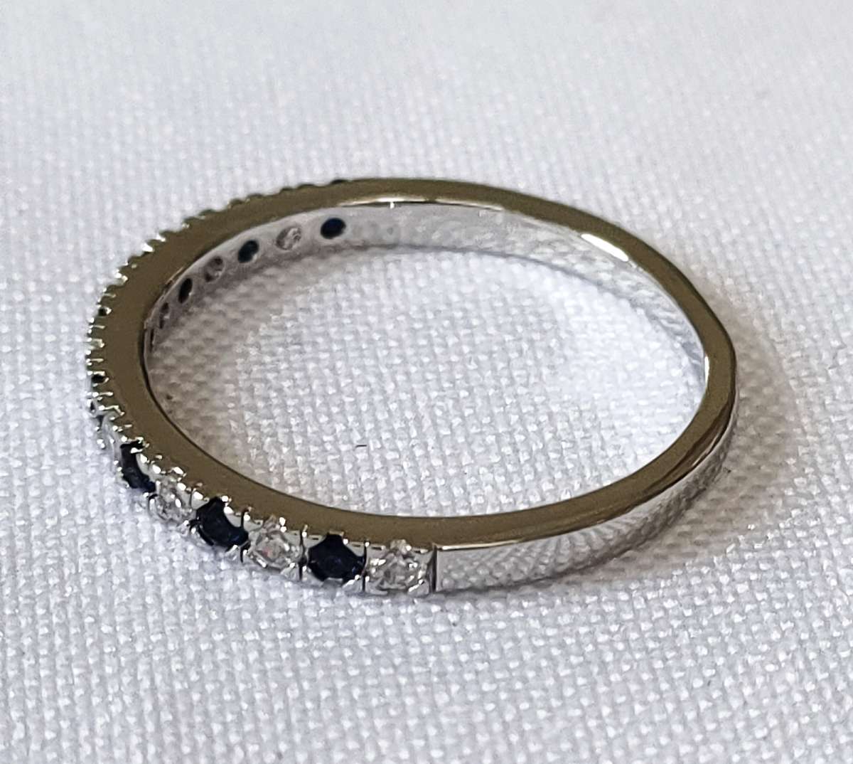 Dress ring -lab created blue and white stones- size US 7