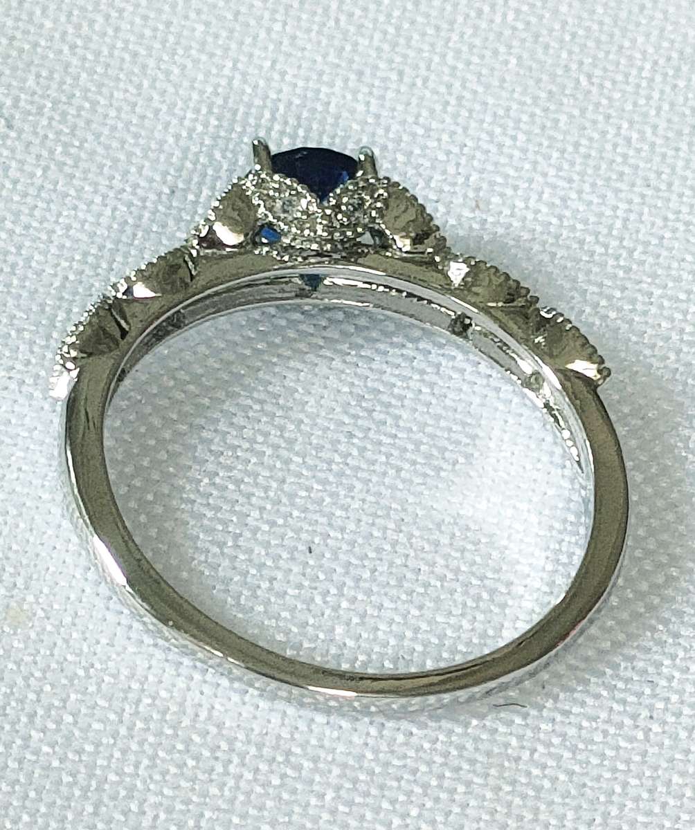 Dress ring -lab created blue and white stones- size US 8