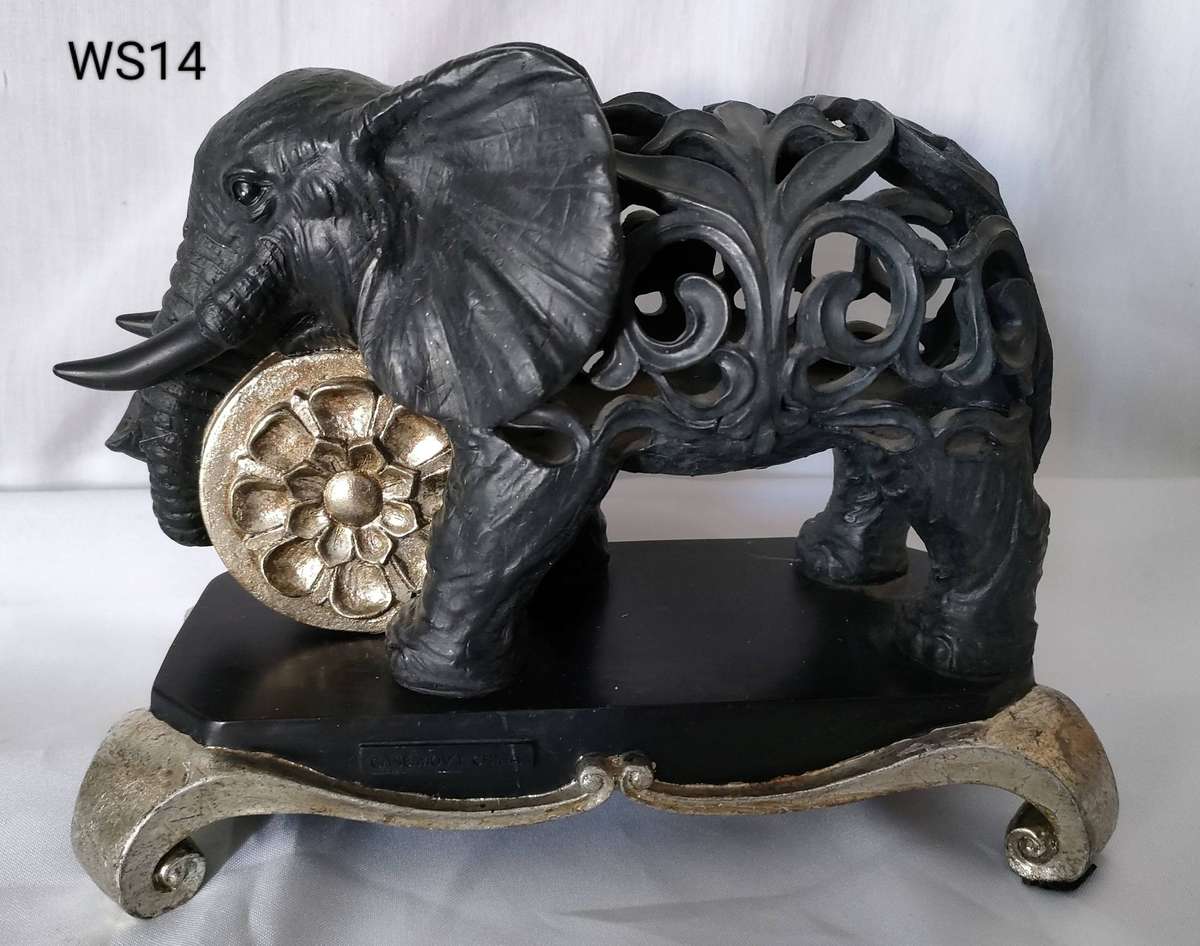Vintage clock in an Elephant cast iron cut-out pattern on a solid metal stand-265x205mm