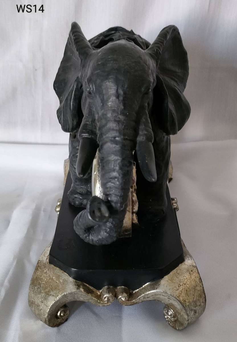 Vintage clock in an Elephant cast iron cut-out pattern on a solid metal stand-265x205mm