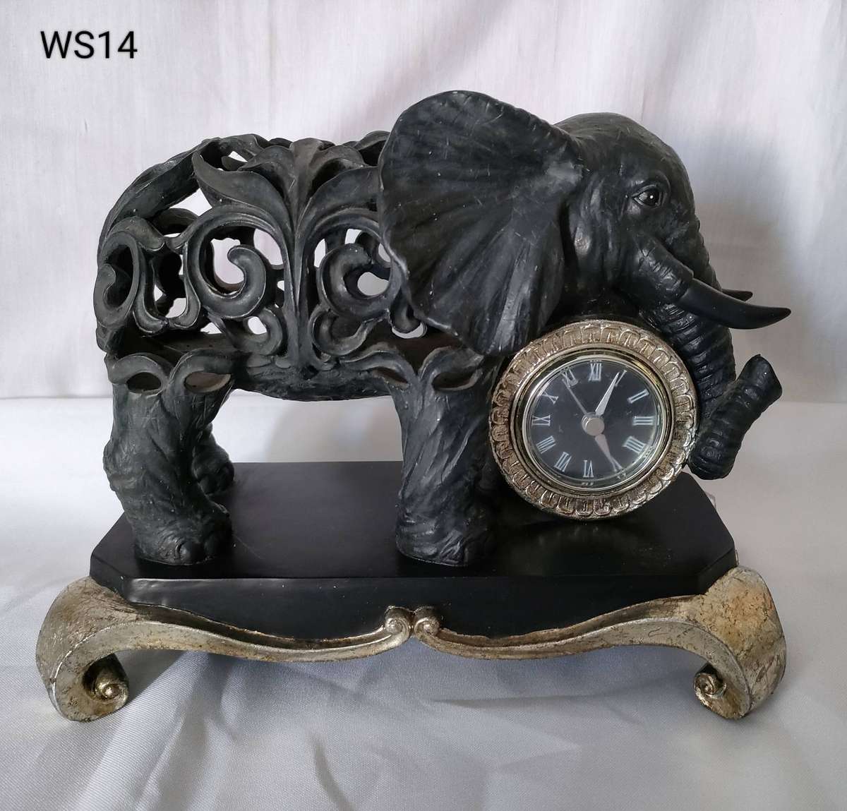 Vintage clock in an Elephant cast iron cut-out pattern on a solid metal stand-265x205mm