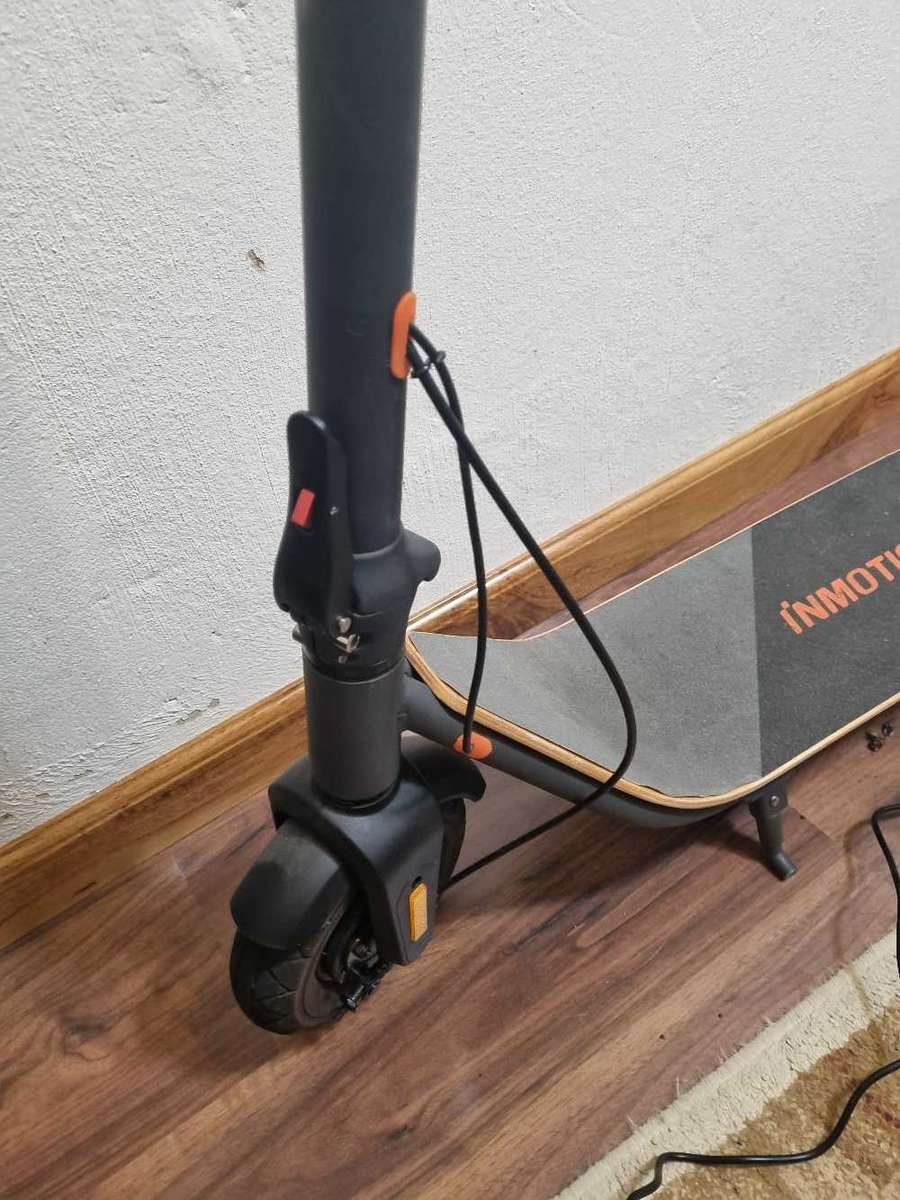 ## Inmotion A1 Electric Scooter with charger, not used much at all ##