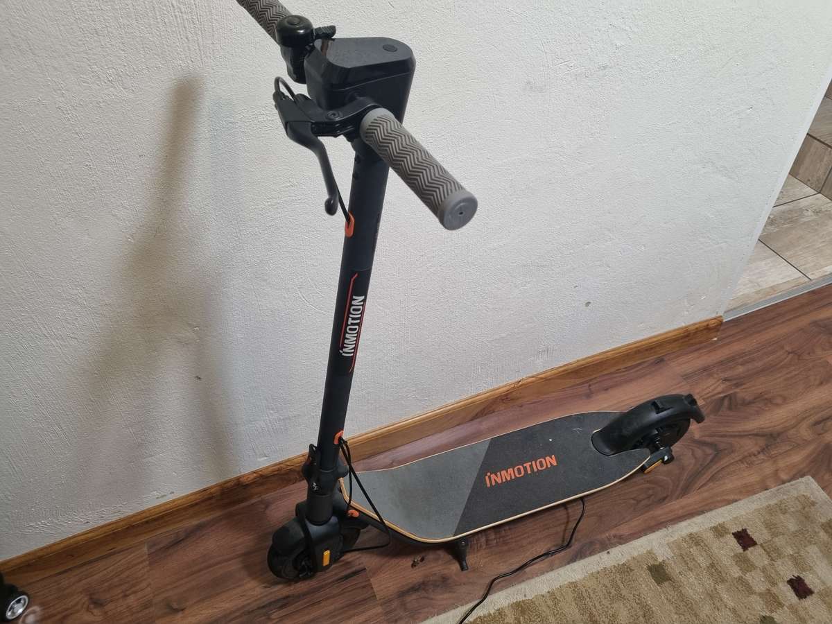 ## Inmotion A1 Electric Scooter with charger, not used much at all ##