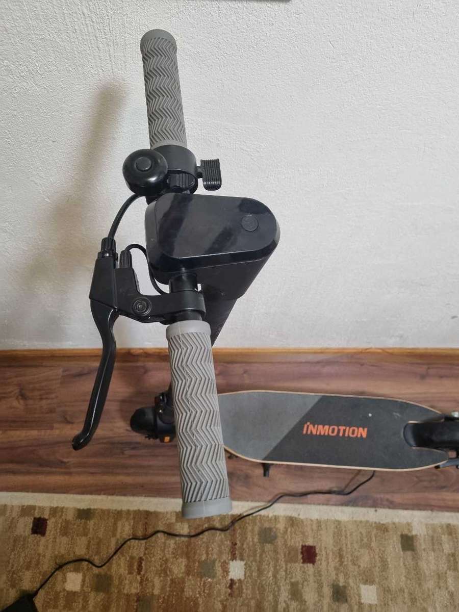 ## Inmotion A1 Electric Scooter with charger, not used much at all ##