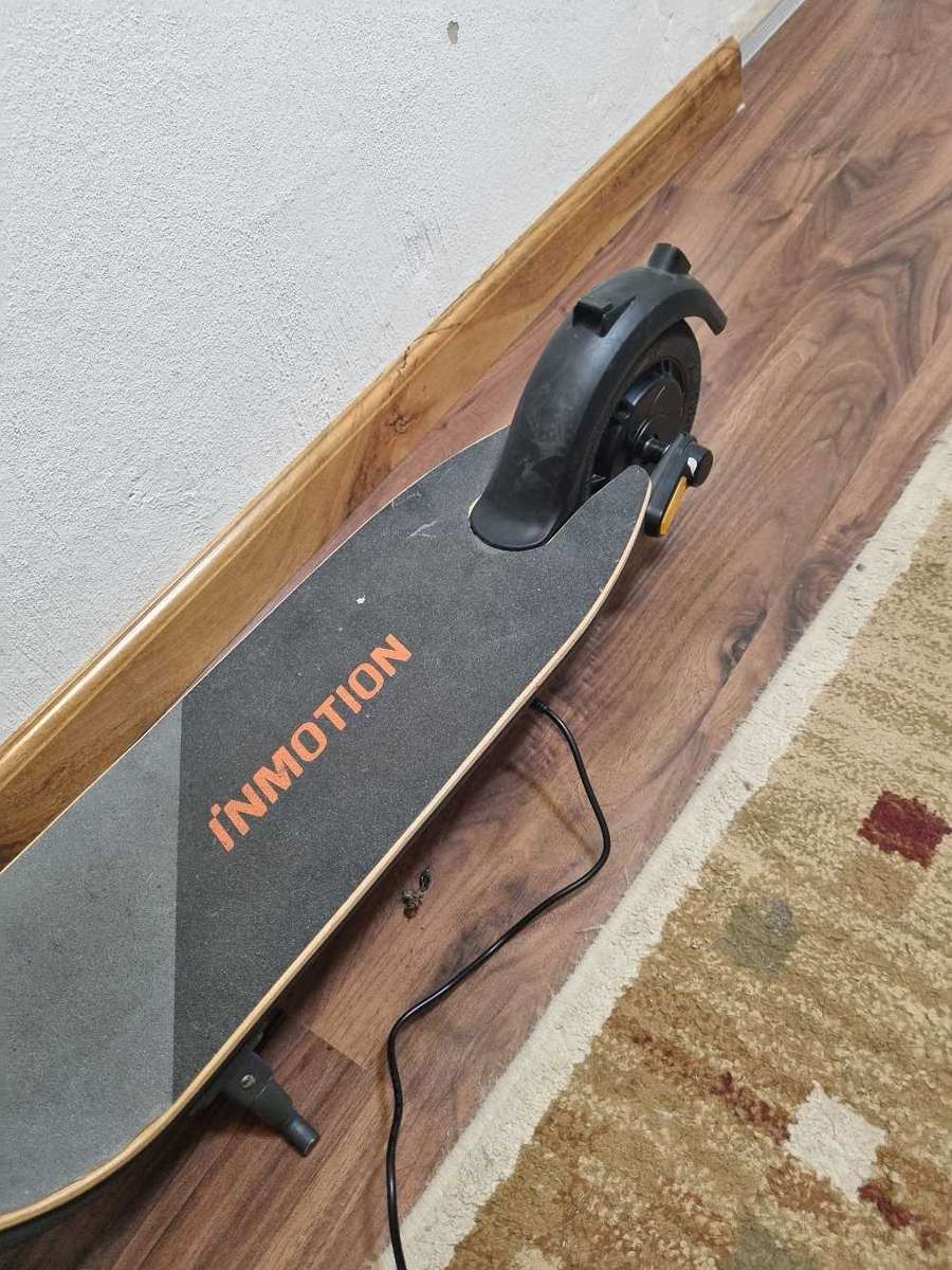 ## Inmotion A1 Electric Scooter with charger, not used much at all ##