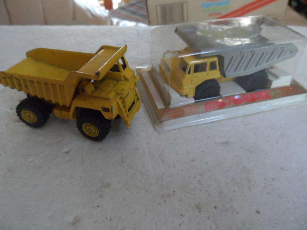 two matchbox size dump trucks- i bid for both  [m300]
