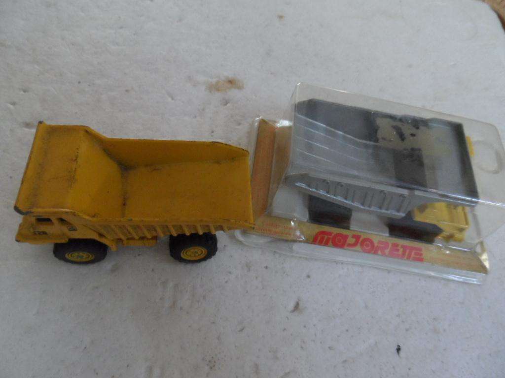 two matchbox size dump trucks- i bid for both  [m300]