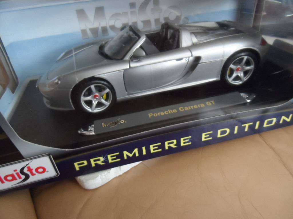 Maisto premiere edition Porsche Carrera gt 1/18 SCALE -silver -NEW IN BOX-