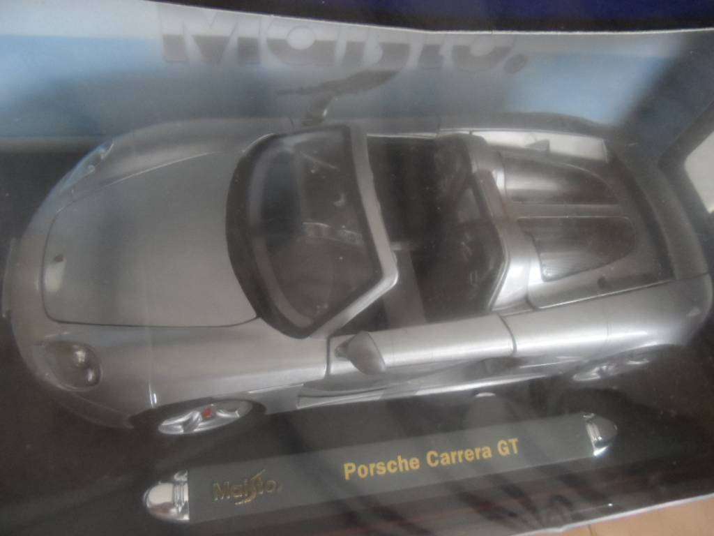 Maisto premiere edition Porsche Carrera gt 1/18 SCALE -silver -NEW IN BOX-