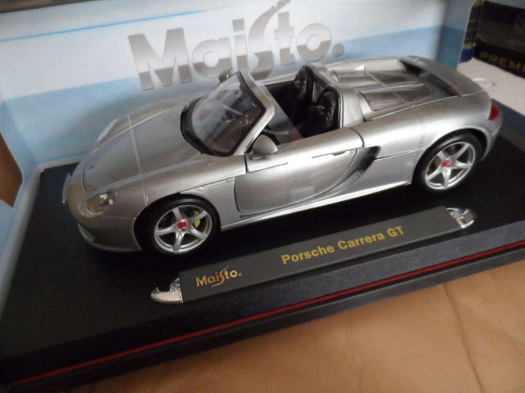 Maisto premiere edition Porsche Carrera gt 1/18 SCALE -silver -NEW IN BOX-