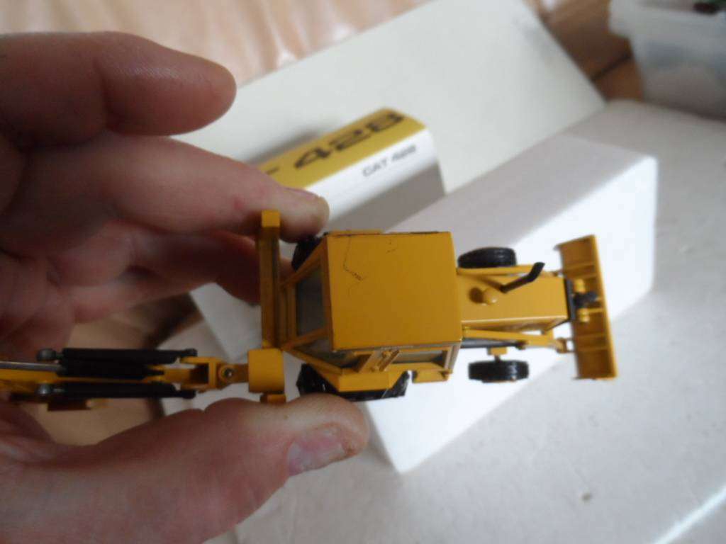 CAT 428 Backhoe Loader Art No. 2851 NZG Diecast Model 1:50- new in Box  [m88]