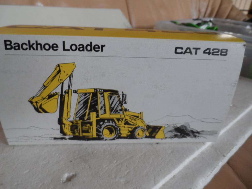 CAT 428 Backhoe Loader Art No. 2851 NZG Diecast Model 1:50- new in Box  [m88]