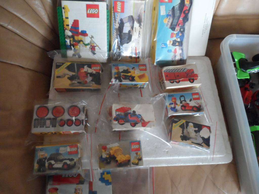 11 small LEGO kits in boxes 4 bases and odds- one bid for all'