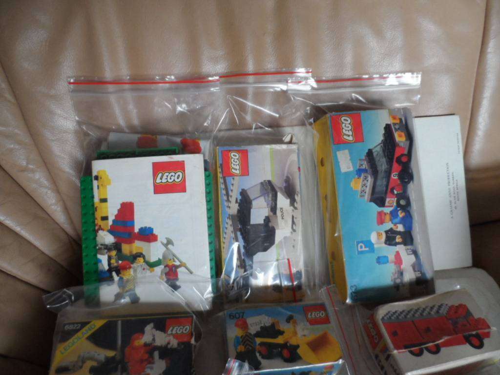 11 small LEGO kits in boxes 4 bases and odds- one bid for all'