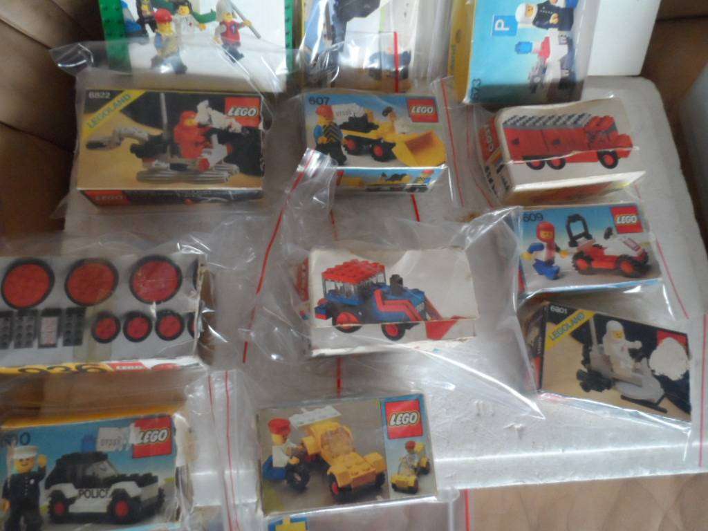 11 small LEGO kits in boxes 4 bases and odds- one bid for all'