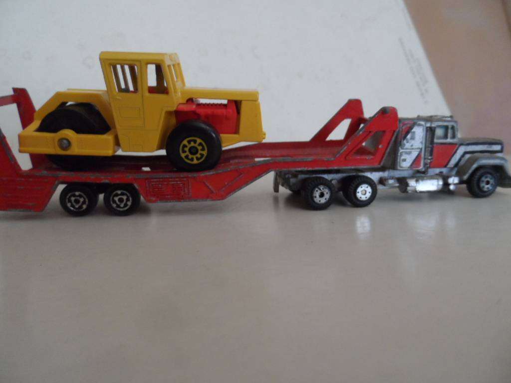 matchbox Bomag roller on yatming truck. one bid for both