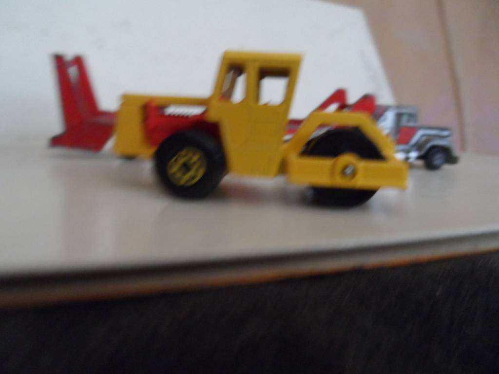 matchbox Bomag roller on yatming truck. one bid for both