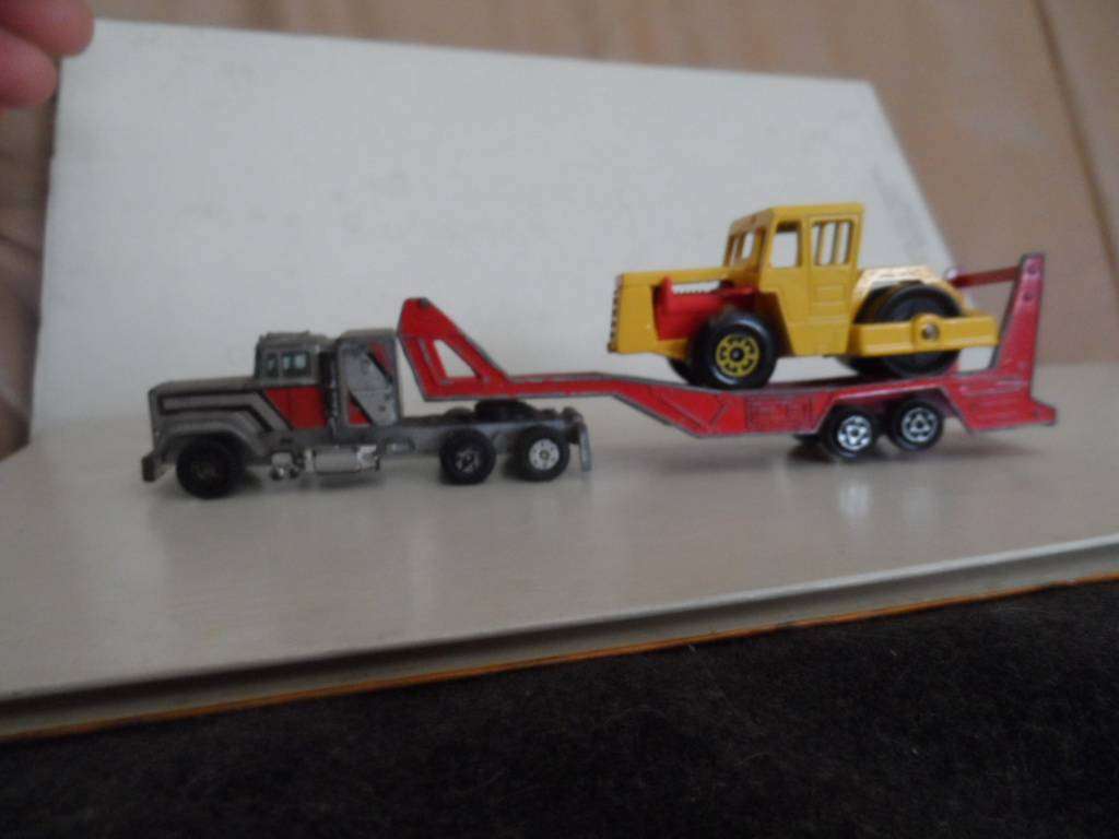 matchbox Bomag roller on yatming truck. one bid for both