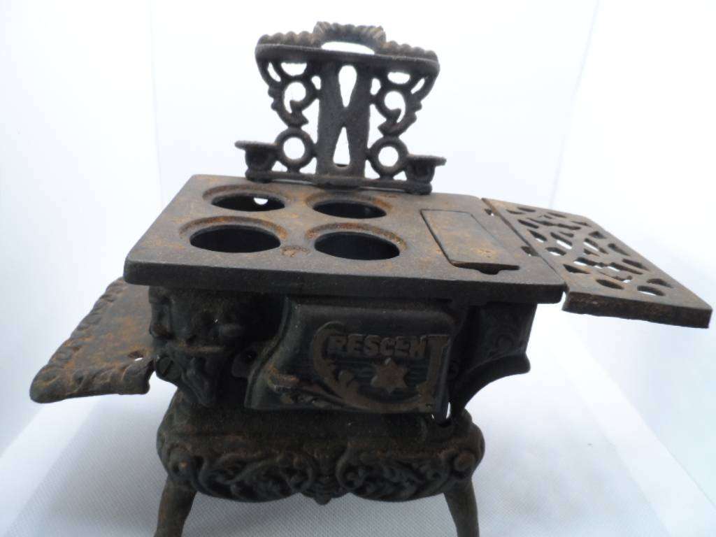 vintage crescent cast iron stove- one bid for all  [d60s]