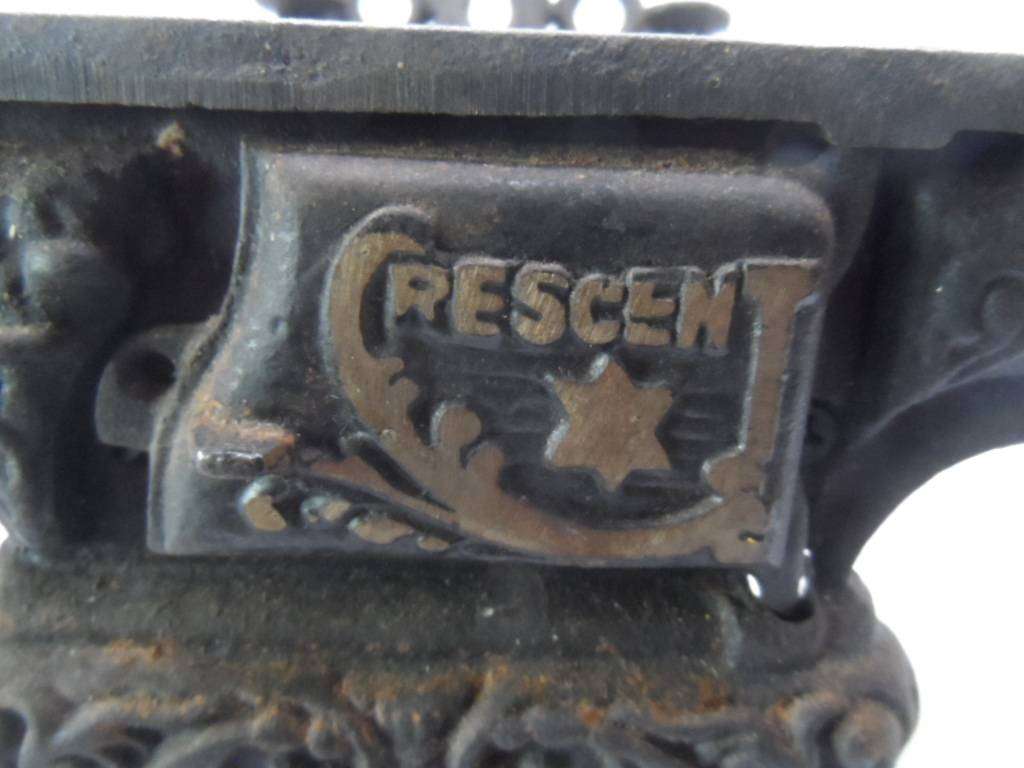 vintage crescent cast iron stove- one bid for all  [d60s]