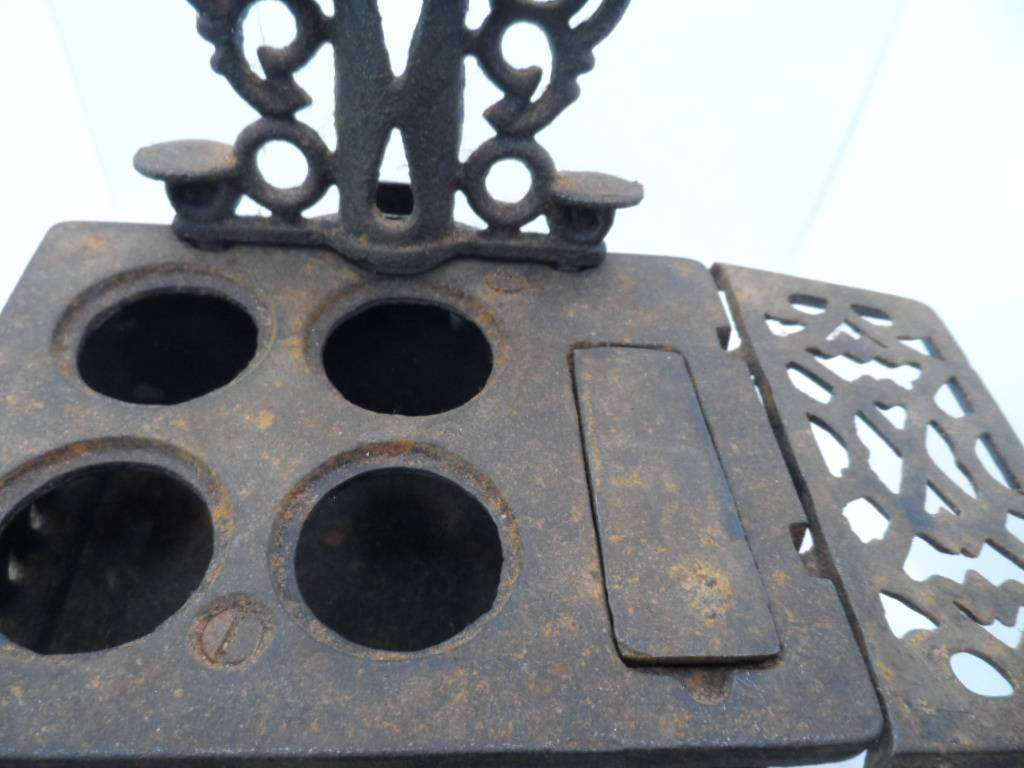 vintage crescent cast iron stove- one bid for all  [d60s]
