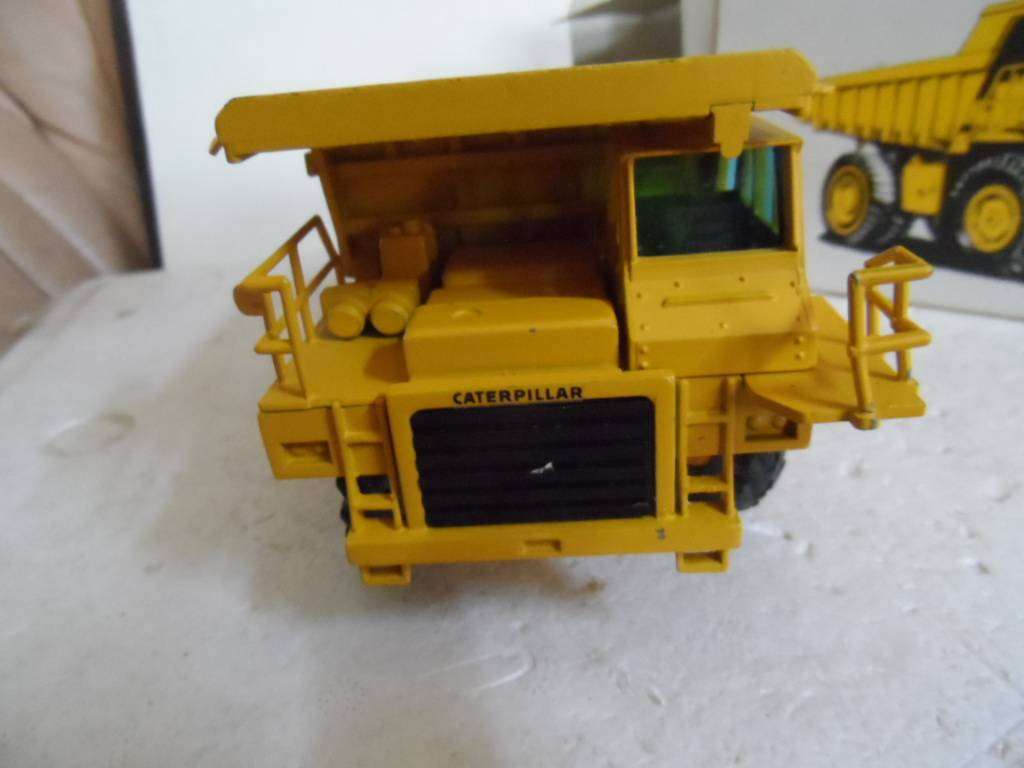 NZG 222 CATERPILLAR 769C SITE DUMPER TRUCK- 1/50