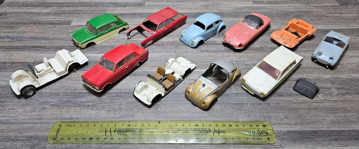 Vintage toy car parts as pictured