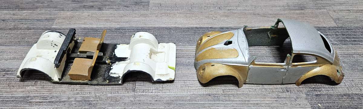 Vintage toy car parts as pictured