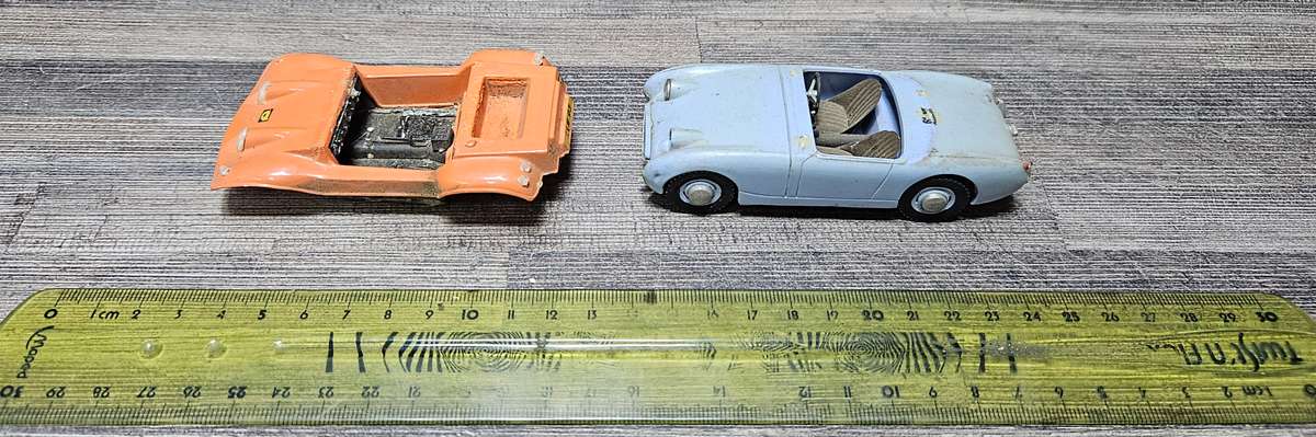 Vintage toy car parts as pictured