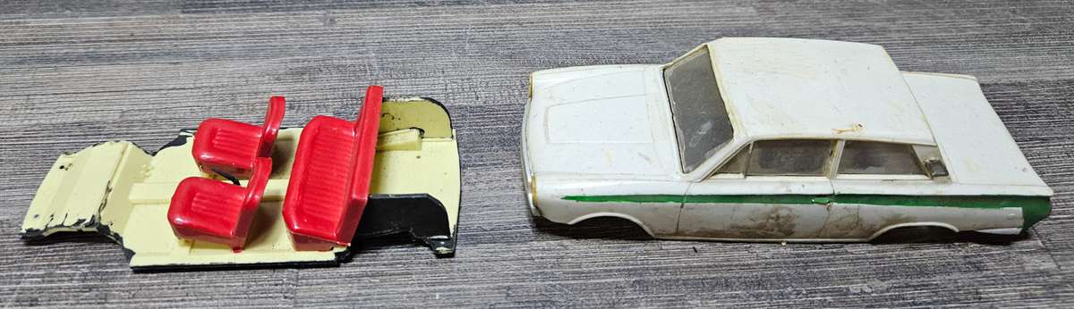 Vintage toy car parts as pictured