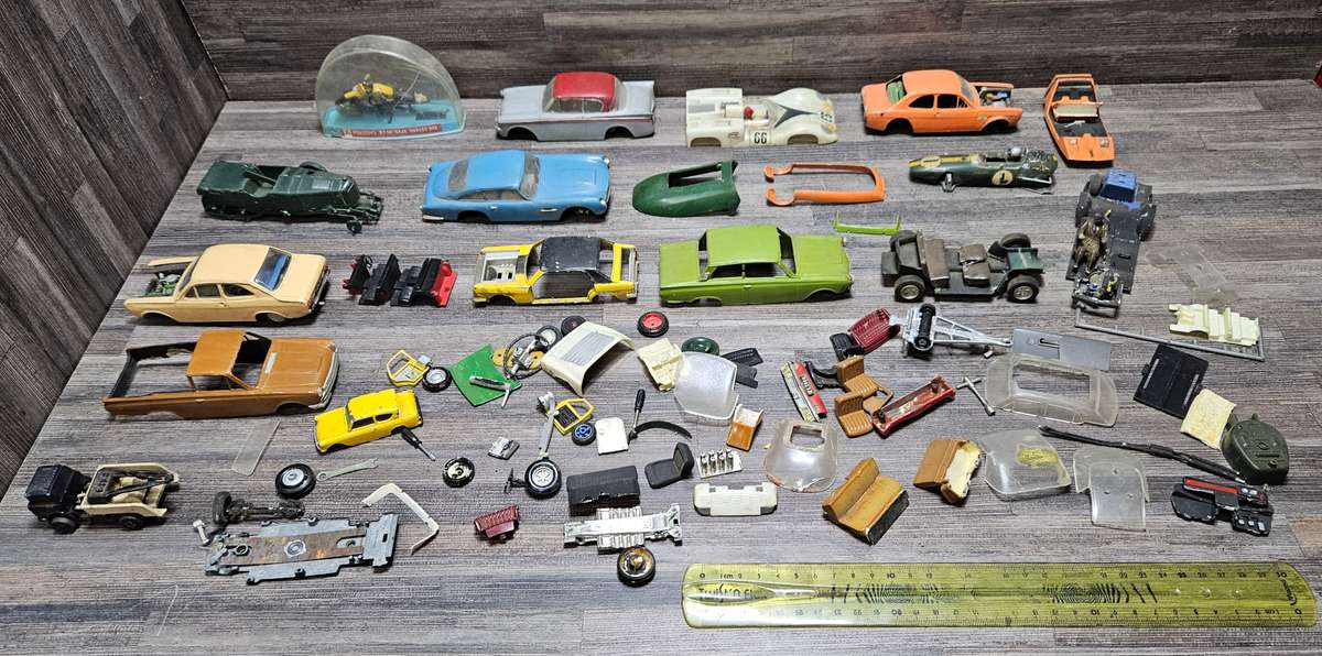 Vintage toy car parts as pictured