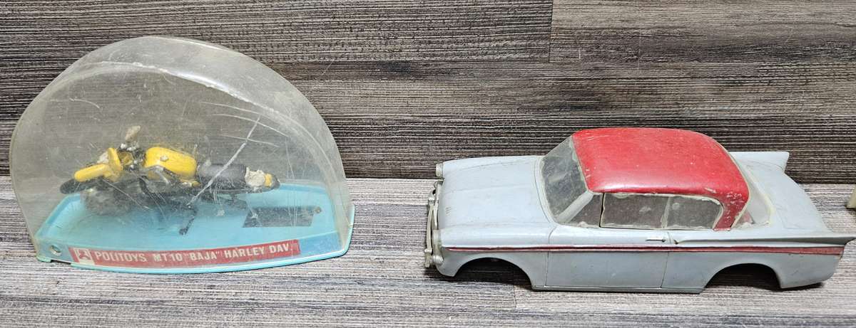 Vintage toy car parts as pictured