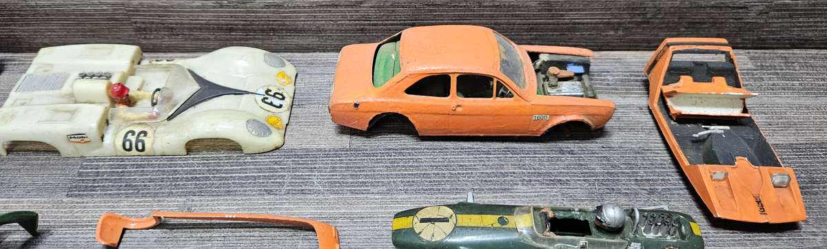 Vintage toy car parts as pictured